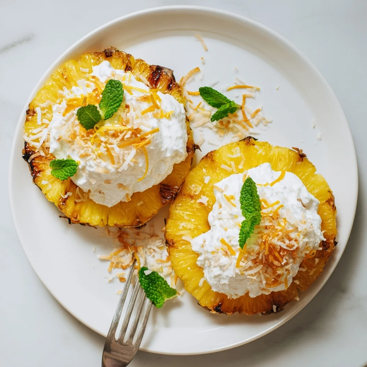 Creamy Citrus Grilled Pineapple with caramelized grill marks and zesty citrus cream