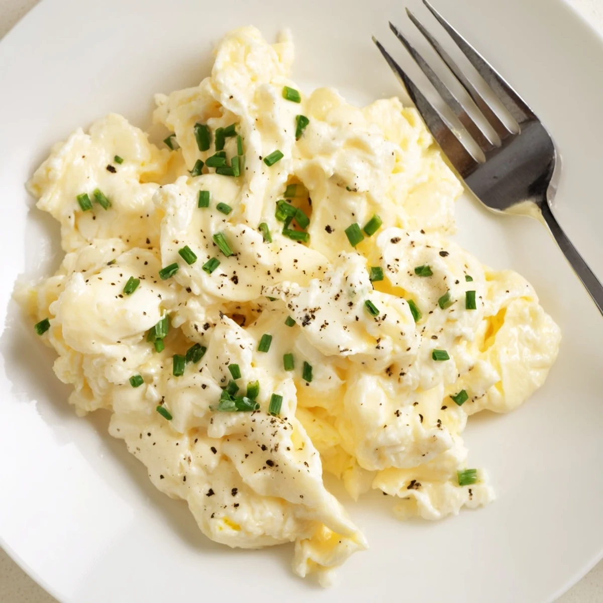 Cottage Cheese Scrambled Eggs with Chives, velvety and fluffy, served with toast