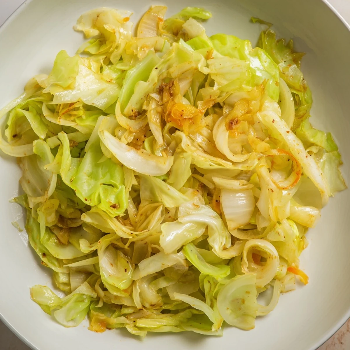 Savory Braised Cabbage Recipe with tender, caramelized onions and smoky paprika  
